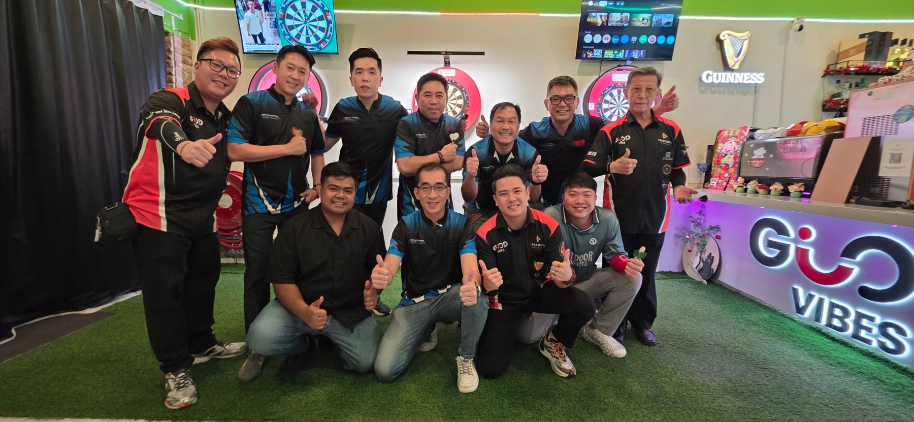 Darts teams posing together at Good Vibes Social Club