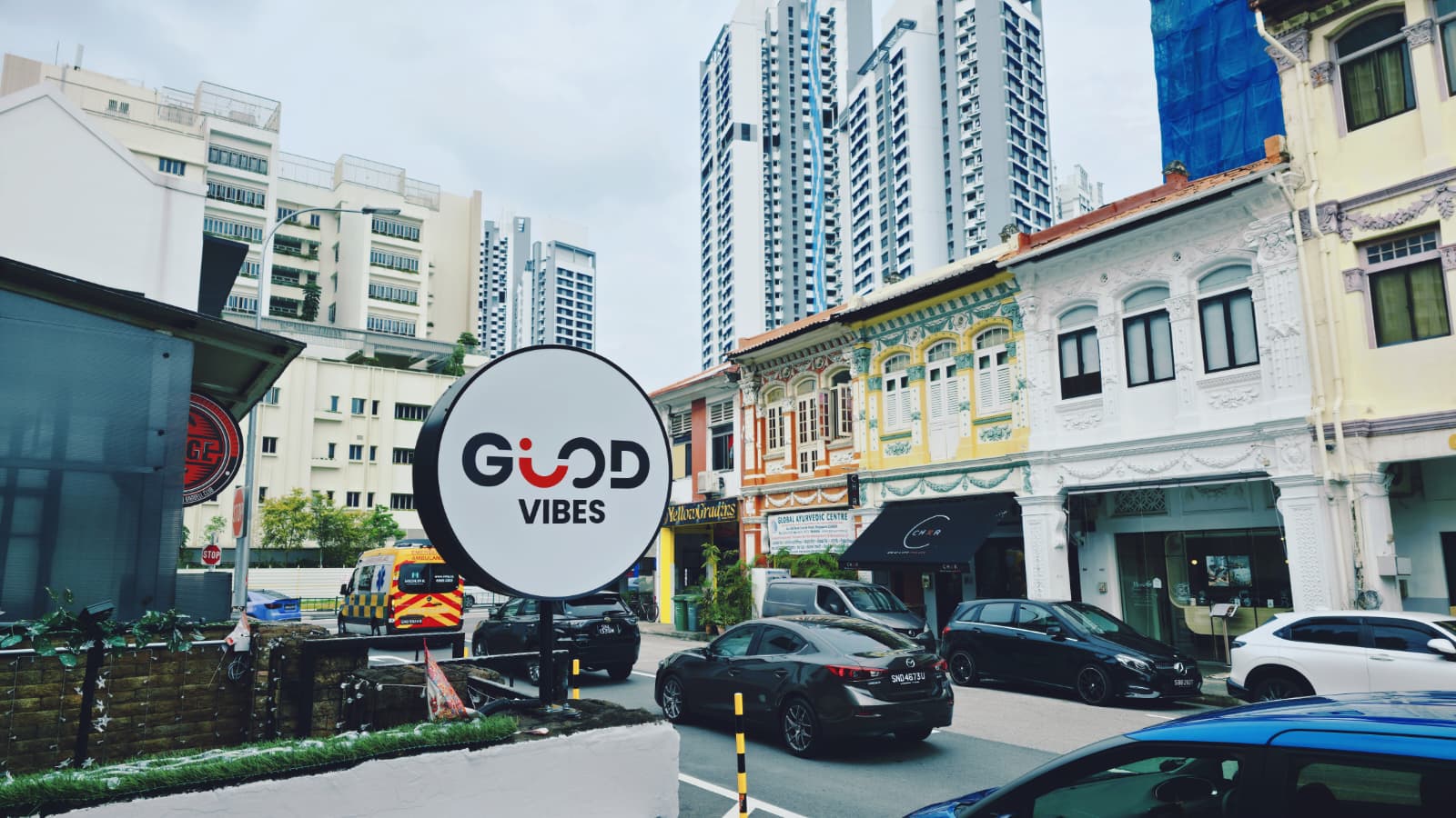 Round Good Vibes sign beside the venue on Race Course Road
